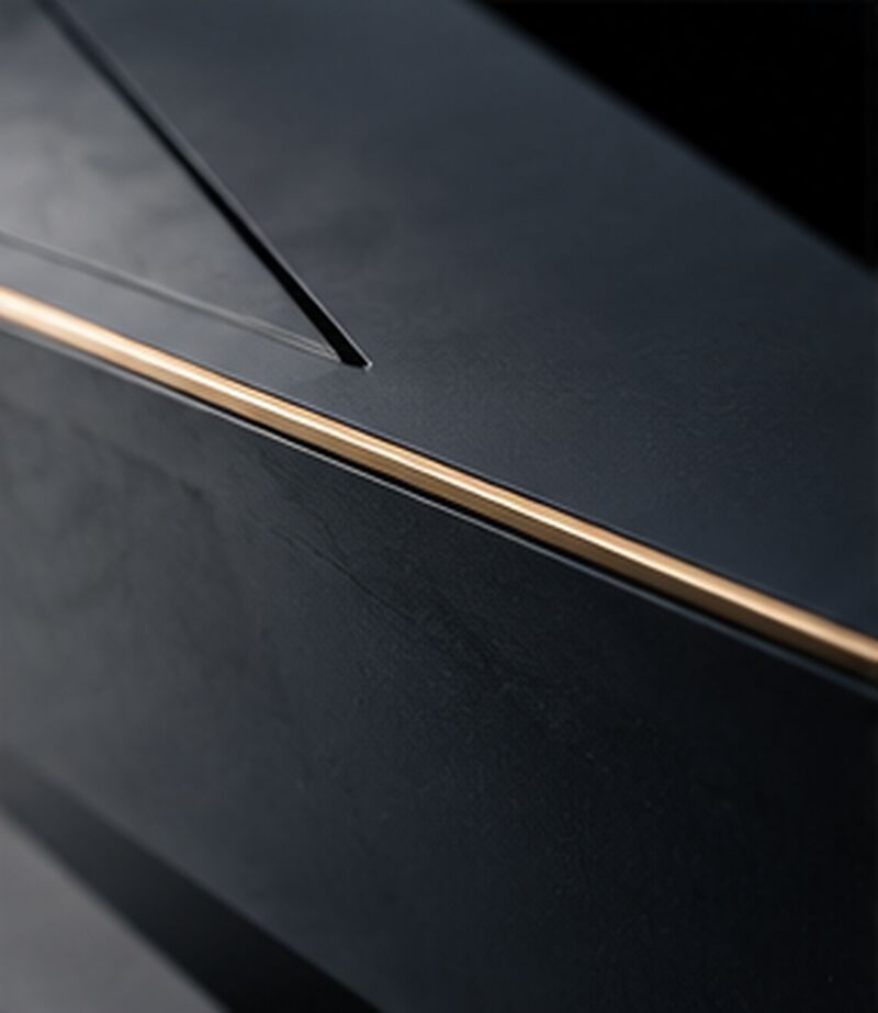 Dark surface with a fine brass edge